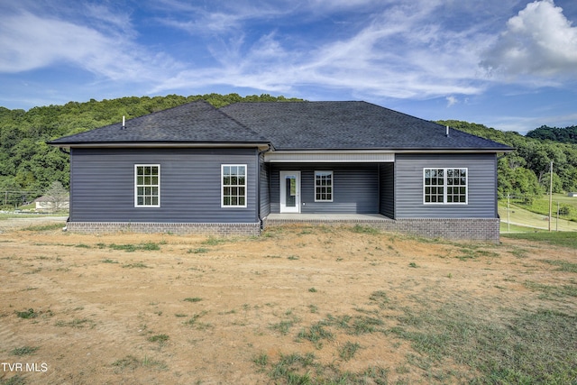 back of house with a patio area