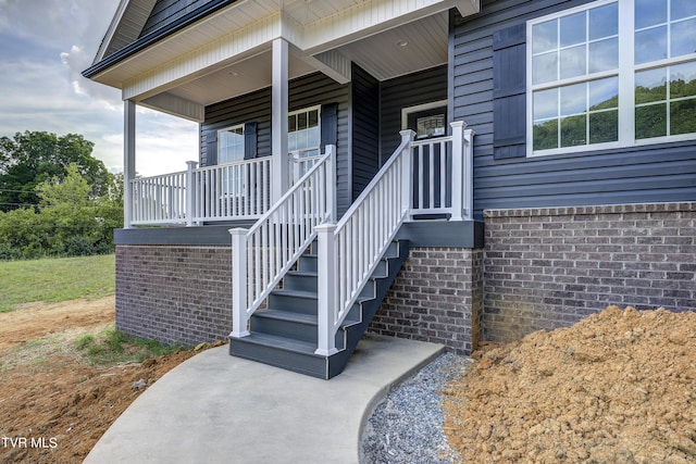 property entrance with a porch