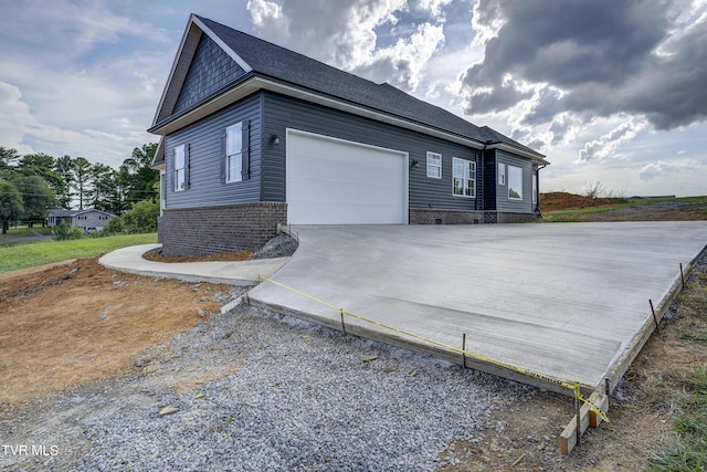 view of property exterior featuring a garage