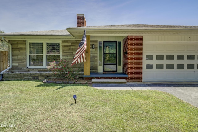 property entrance with a lawn, a porch, and a garage