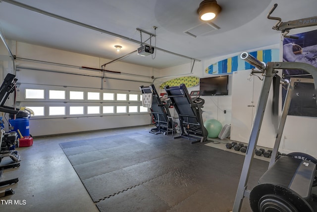 garage featuring a garage door opener