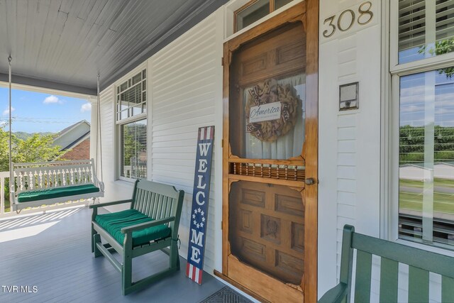308 E Pearl Ave, Big Stone Gap, VA 24219 - view of exterior entry with a porch