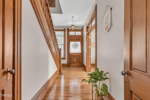 entryway with light hardwood / wood-style flooring