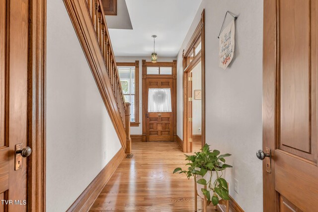 308 E Pearl Ave, Big Stone Gap, VA 24219 - foyer entrance featuring light wood-type flooring and stairs