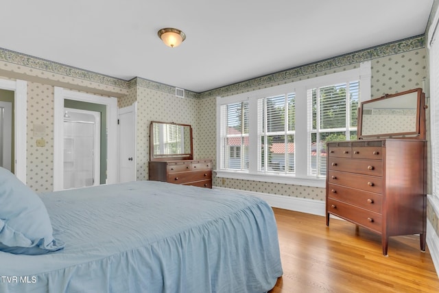 bedroom featuring light hardwood / wood-style floors