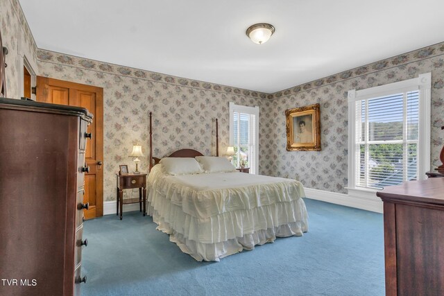 308 E Pearl Ave, Big Stone Gap, VA 24219 - bedroom with dark carpet and wallpapered walls
