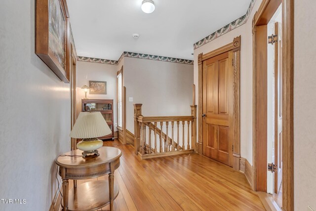308 E Pearl Ave, Big Stone Gap, VA 24219 - hallway with an upstairs landing and light wood-style flooring