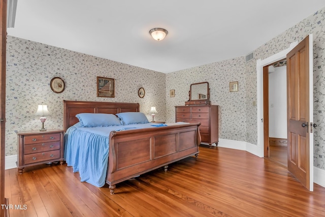 bedroom featuring hardwood / wood-style flooring