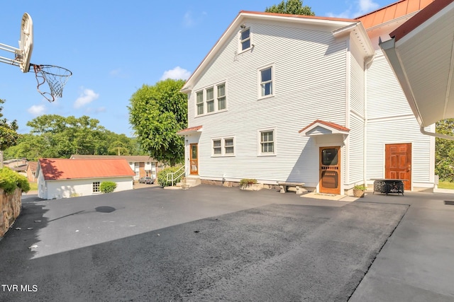 view of property exterior with a garage