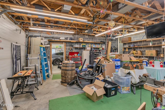 basement with a workshop area