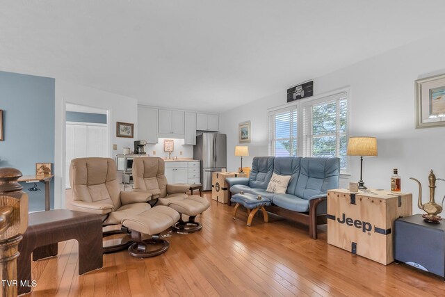 308 E Pearl Ave, Big Stone Gap, VA 24219 - living area featuring light wood-style flooring