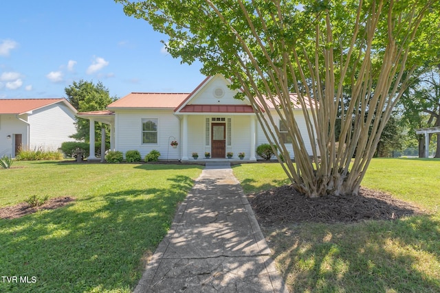 view of front facade with a front lawn and a porch