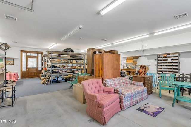 living room featuring concrete flooring