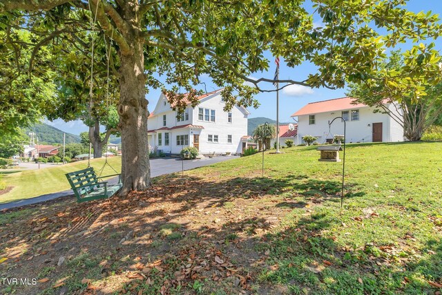 308 E Pearl Ave, Big Stone Gap, VA 24219 - view of grassy yard with a mountain view