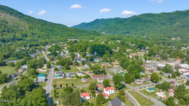 308 E Pearl Ave, Big Stone Gap, VA 24219 - aerial view of property and surrounding area with a mountainous background