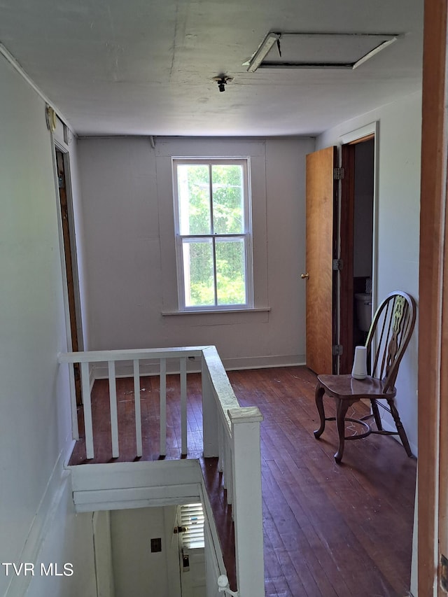 bedroom with hardwood / wood-style floors