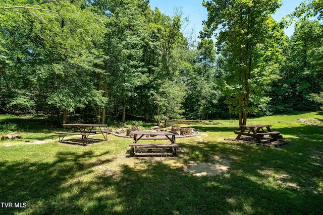 surrounding community featuring a lawn