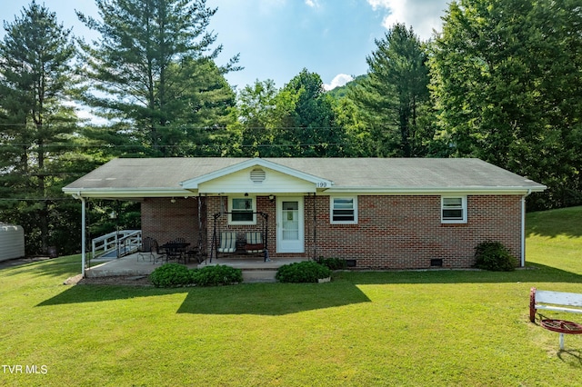 single story home featuring a patio area and a front yard