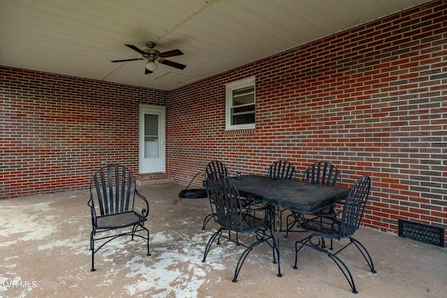 view of patio / terrace featuring ceiling fan