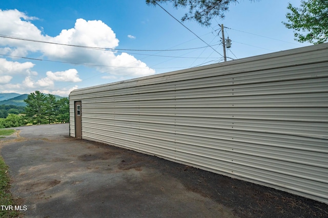 garage featuring a mountain view