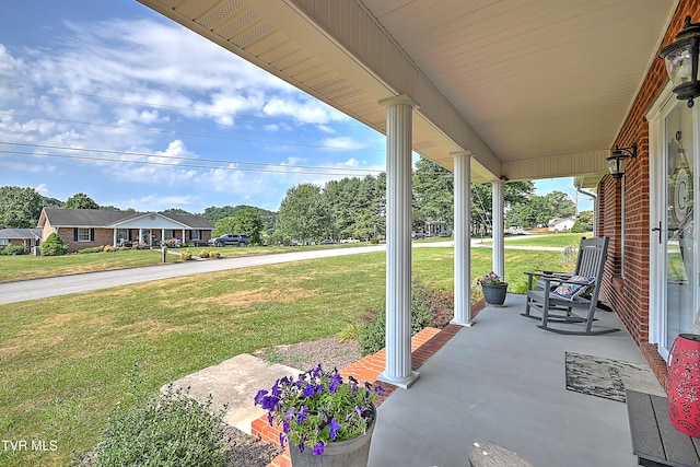 view of patio featuring a porch