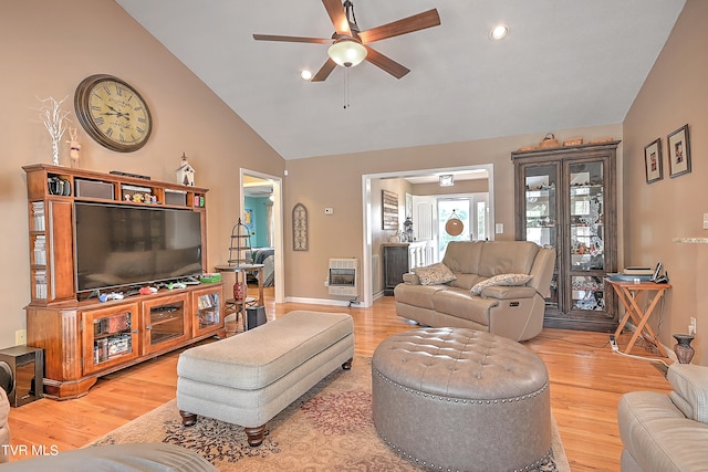 living room featuring high vaulted ceiling, ceiling fan, and wood-type flooring