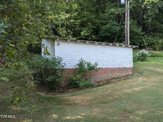 view of property exterior featuring a yard