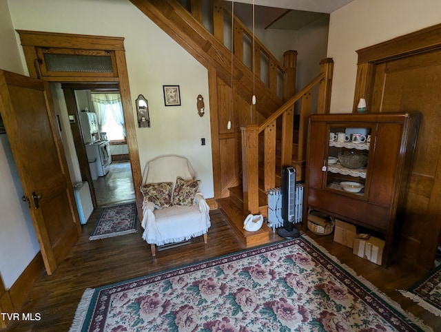 sitting room featuring dark hardwood / wood-style floors