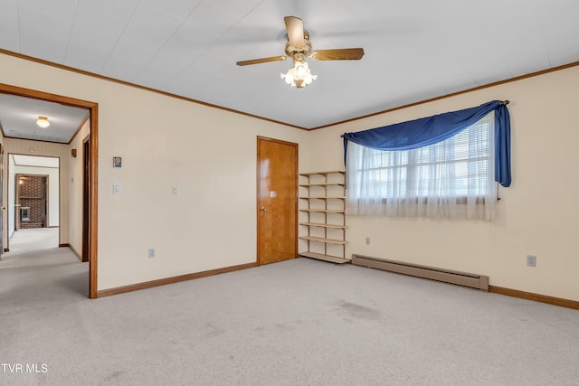 3054 Redbud Hwy, Honaker, VA 24260 - unfurnished room with a baseboard heating unit, carpet floors, crown molding, and a ceiling fan