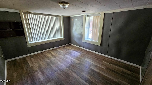 spare room with wood-type flooring