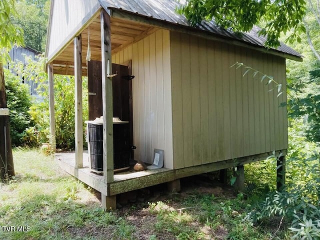 view of outdoor structure featuring central AC unit