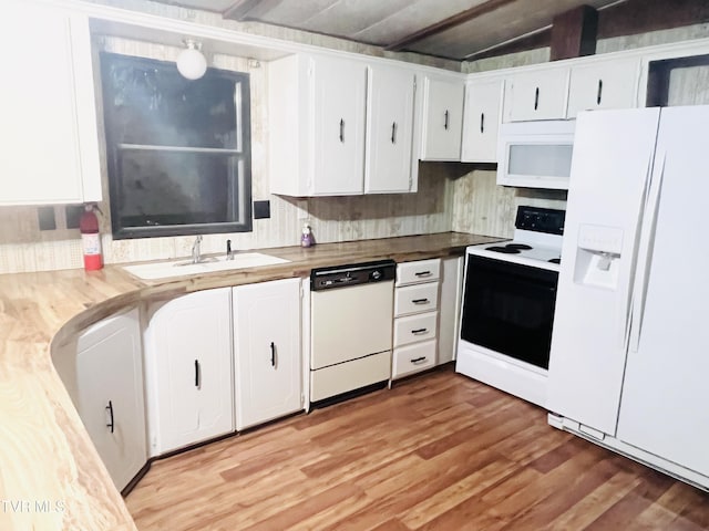 kitchen with white cabinetry, sink, white appliances, and light wood-type flooring