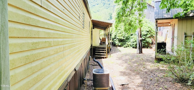 view of home's exterior featuring central air condition unit