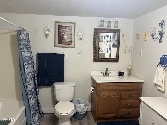 full bathroom featuring shower / tub combo with curtain, vanity, toilet, and hardwood / wood-style floors