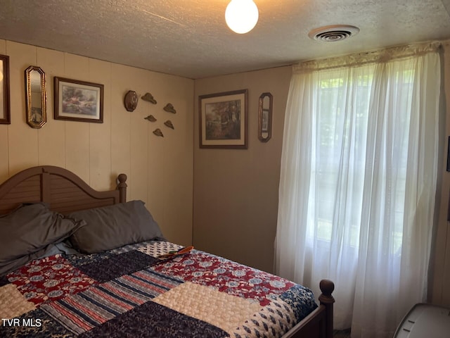 bedroom with a textured ceiling