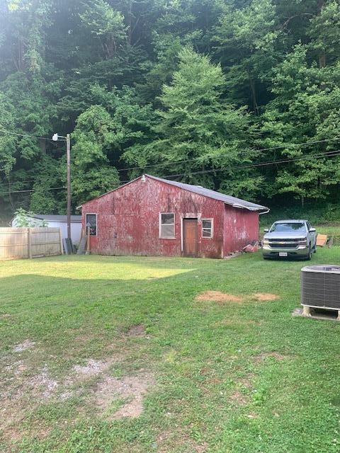 view of yard featuring central AC