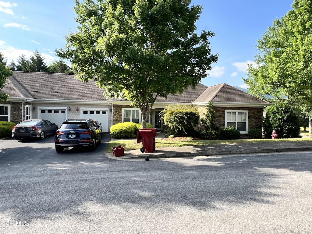 view of front of property featuring a garage