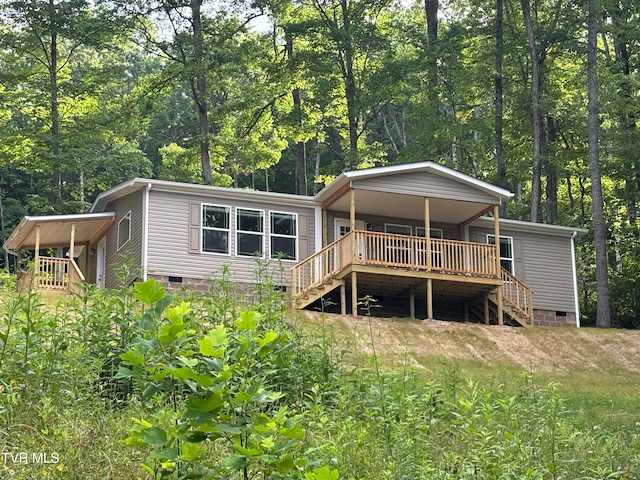 rear view of house with a deck