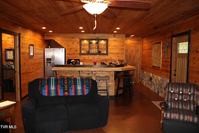 2044 Pigeon Creek Rd, Greeneville, TN 37743 - living room featuring wood ceiling, wooden walls, and recessed lighting