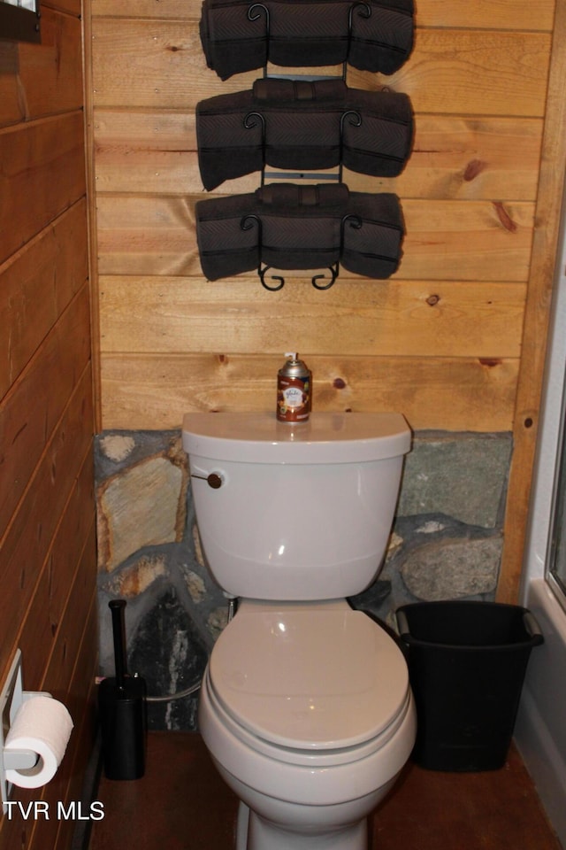 2044 Pigeon Creek Rd, Greeneville, TN 37743 - full bathroom featuring toilet, wooden walls, and walk in shower