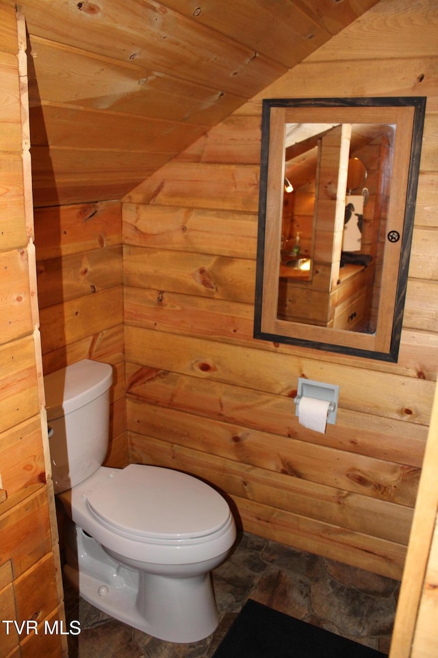 2044 Pigeon Creek Rd, Greeneville, TN 37743 - bathroom with vaulted ceiling, wood walls, and toilet