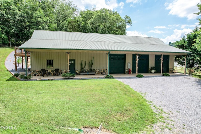 2044 Pigeon Creek Rd, Greeneville, TN 37743 - country-style home with an attached garage, driveway, a front lawn, and metal roof