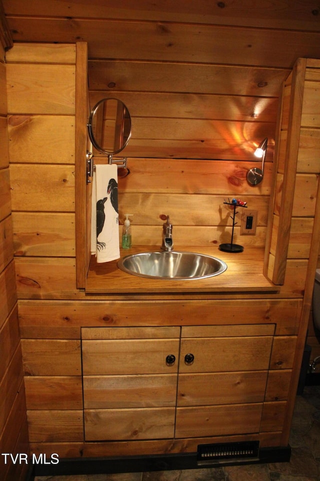 2044 Pigeon Creek Rd, Greeneville, TN 37743 - bathroom featuring wooden walls and vanity