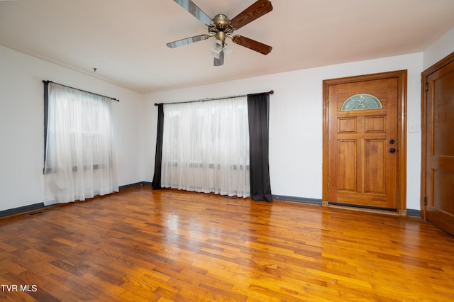 interior space featuring light hardwood / wood-style flooring and ceiling fan