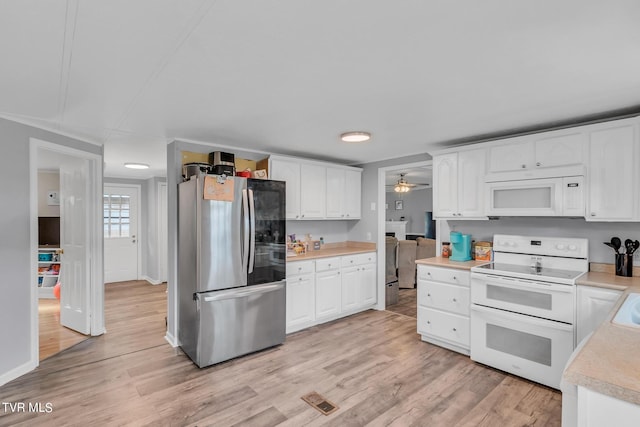 kitchen with light hardwood / wood-style floors, white cabinetry, ceiling fan, and white appliances