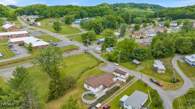 aerial view with a view of trees and a residential view