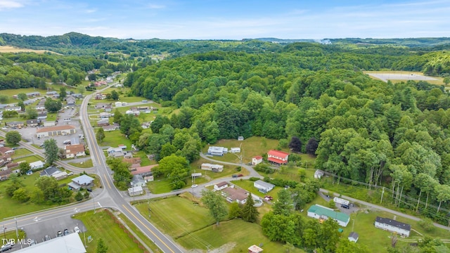 aerial view with a wooded view