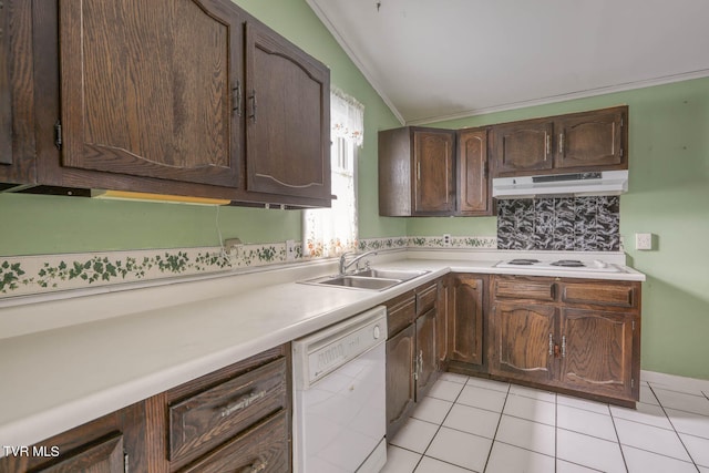 kitchen featuring white appliances, vaulted ceiling, sink, dark brown cabinets, and light tile patterned flooring