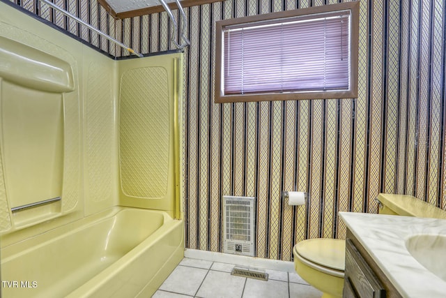 full bathroom featuring vanity, toilet, bathing tub / shower combination, and tile patterned flooring