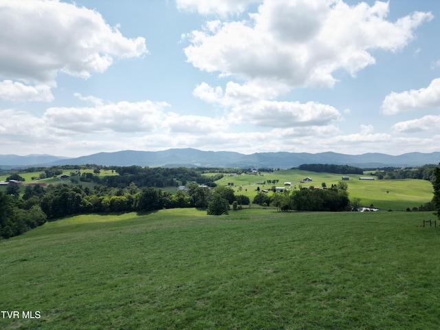 view of mountain feature with a rural view